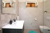 Koupelna v ubytování Apartmani Marta