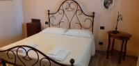 Posteľ alebo postele v izbe v ubytovaní Agriturismo Le Chiare Stelle