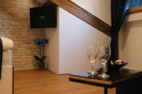 TV a/nebo společenská místnost v ubytování Oblivion Luxury Rooms