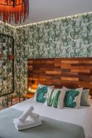 Postel nebo postele na pokoji v ubytování Hotel Posada de las Cuevas