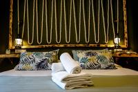 Postel nebo postele na pokoji v ubytování Hotel Posada de las Cuevas