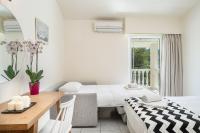 Posteľ alebo postele v izbe v ubytovaní Sunrise Rent Rooms