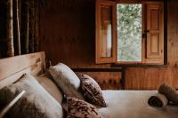 Posteľ alebo postele v izbe v ubytovaní DURMIENDO ENTRE ARBOLES, Bonita cabaña en La Rioja