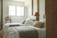Posteľ alebo postele v izbe v ubytovaní Hotel Caserio Aldeallana