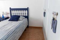 Posteľ alebo postele v izbe v ubytovaní Apartamento Maruja Roig 2 Playa Sur
