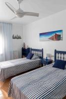 Posteľ alebo postele v izbe v ubytovaní Apartamento Maruja Roig 2 Playa Sur