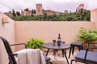 Un balcón o terraza de CANDIL SUITE Origen