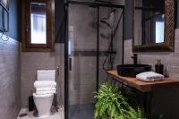 Un baño de CANDIL SUITE Origen