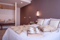 Cama o camas de una habitación en CANDIL SUITE Origen