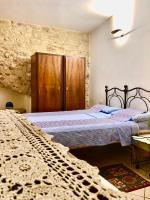 Posteľ alebo postele v izbe v ubytovaní Assisi Anfiteatro Romano