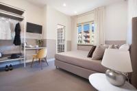 Televízia a/alebo spoločenská miestnosť v ubytovaní La Cassarmonica Guest House
