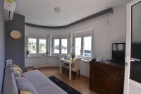 Televízia a/alebo spoločenská miestnosť v ubytovaní The Dream On Apartment