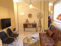 Televízia a/alebo spoločenská miestnosť v ubytovaní San Rafael 2 Apartments