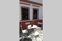Patio lub wspólna przestrzeń na świeżym powietrzu w obiekcie LA BARSONERA