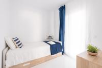 Postel nebo postele na pokoji v ubytování Santa Pola Apartments