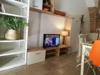 A television and/or entertainment centre at Borgoantico Apartment