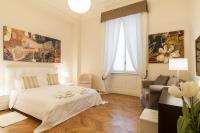 A bed or beds in a room at Milan Royal Suites - Centro Cadorna