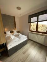 Postel nebo postele na pokoji v ubytování Apartament Drewno i Morze