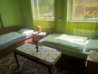 Posteľ alebo postele v izbe v ubytovaní Tatry Liptov