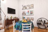Televízia a/alebo spoločenská miestnosť v ubytovaní Apartments Caleta