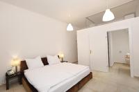 Postel nebo postele na pokoji v ubytování Stylische Cityapartments Benedikt