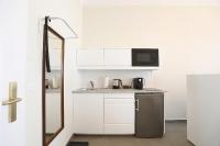 Kuchyň nebo kuchyňský kout v ubytování Stylische Cityapartments Benedikt