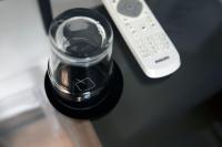 a remote control sitting on top of a table at Quentin Golden Bear Hotel in Amsterdam