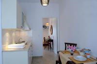 Kuchyň nebo kuchyňský kout v ubytování Tsakanos Apartments
