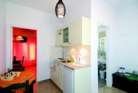 Kuchyň nebo kuchyňský kout v ubytování Tsakanos Apartments