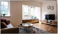 Televízia a/alebo spoločenská miestnosť v ubytovaní Ferienwohnung Seeblick Grundlsee
