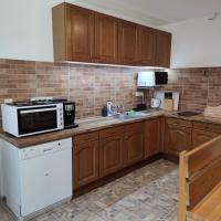 Kuchyň nebo kuchyňský kout v ubytování Apartmán Špacír