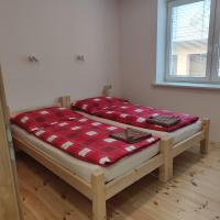 Postel nebo postele na pokoji v ubytování Apartmán Špacír