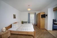 Łóżko lub łóżka w pokoju w obiekcie Gästehaus Lienharterhof