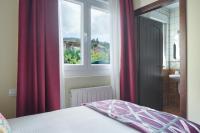 Posteľ alebo postele v izbe v ubytovaní Hotel Txoriene - Arrieta - HBI01298