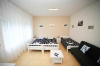 Posteľ alebo postele v izbe v ubytovaní Apartment Kamov