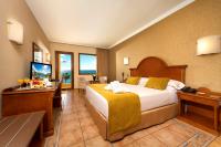 A bed or beds in a room at Hotel IPV Palace & Spa - Adults Recommended