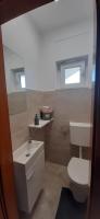 Kúpeľňa v ubytovaní Apartment Lukrecija