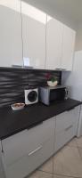 Kuchyňa alebo kuchynka v ubytovaní Apartment Lukrecija