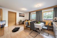 Posedenie v ubytovaní AlpenChalet Niederkofler