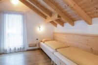 A bed or beds in a room at Apartment Kronplatz