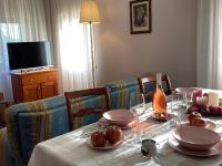 A television and/or entertainment centre at Casa Oliva Castelletto di Brenzone