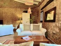 Posezení v ubytování Hotel Masia La Palma