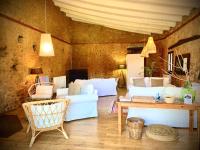 Posezení v ubytování Hotel Masia La Palma