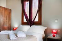 Postel nebo postele na pokoji v ubytování Fantasia Villas Deluxe "Selene"