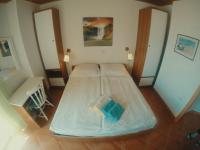 Postel nebo postele na pokoji v ubytování Apartements Magdalena