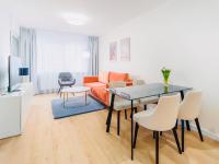 Televízia a/alebo spoločenská miestnosť v ubytovaní Apart111 Apartamenty - Garden