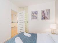 Posteľ alebo postele v izbe v ubytovaní Apart111 Apartamenty - Garden