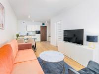 Televízia a/alebo spoločenská miestnosť v ubytovaní Apart111 Apartamenty - Garden