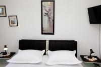 Posteľ alebo postele v izbe v ubytovaní Apartments ITD