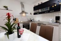 Kuchyňa alebo kuchynka v ubytovaní Apartments ITD